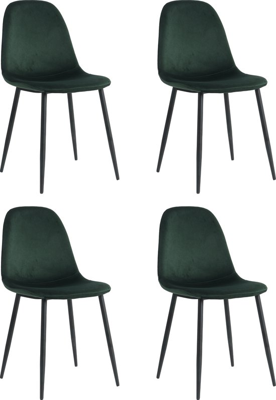 Vier groene fluwelen stoelen met zwarte poten op een witte achtergrond.