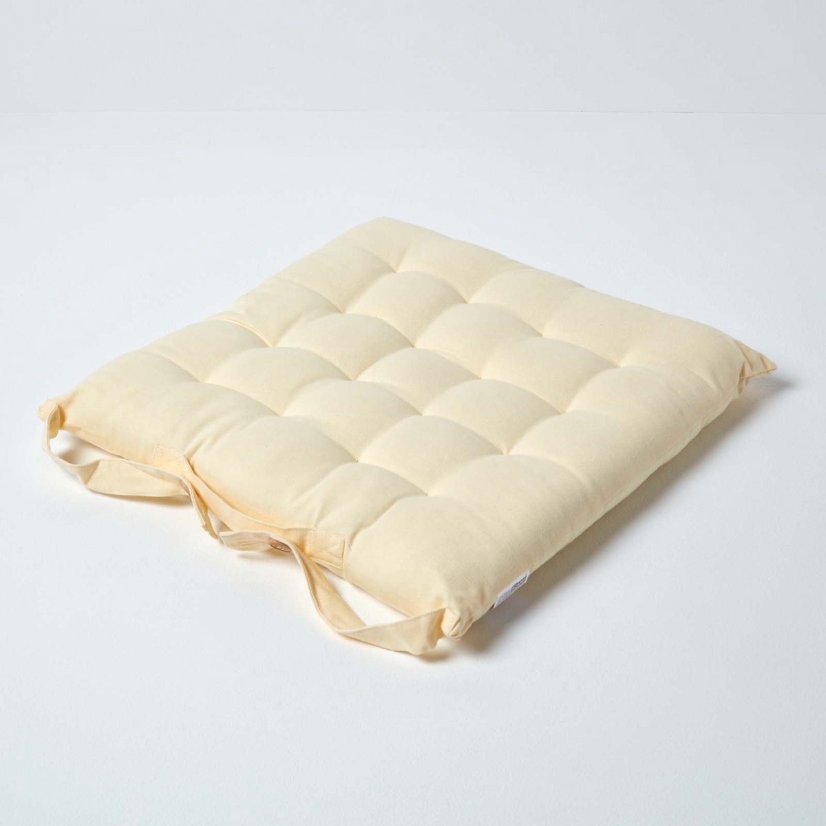 Homescapes stoelkussen – katoenen zitkussen – crème – 40x40 cm – met lint – voor eetkamer & buitengebruik