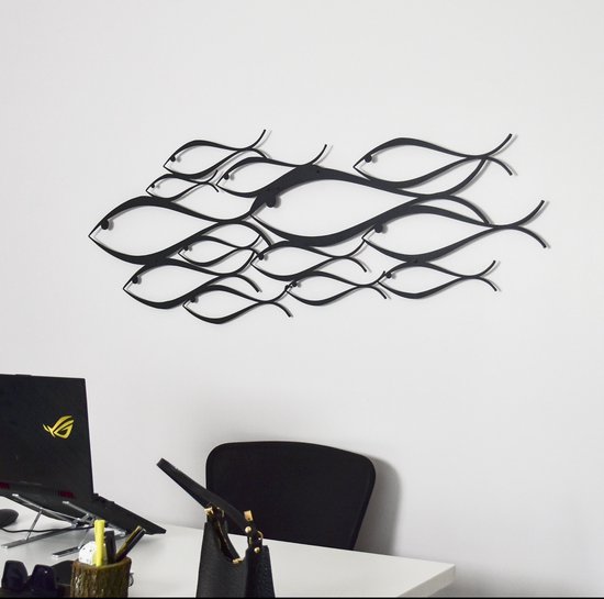 Metalen wanddecoratie met school vissen