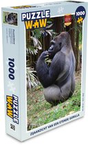 Puzzel Zijaanzicht van een etende Gorilla - Legpuzzel - Puzzel 1000 stukjes volwassenen