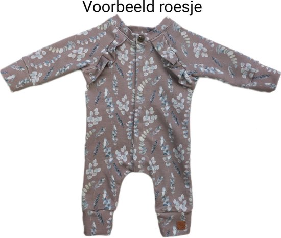 Foto: Spreid pavlik gips onesie zwart met takjes met roesje