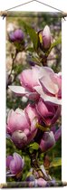 Textielposter - Roze Magnolia Bloemen aan Struik in het Veld - 30x90 cm Foto op Textiel