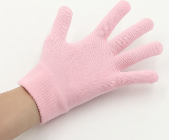 Roze spa gel handschoen op een hand.
