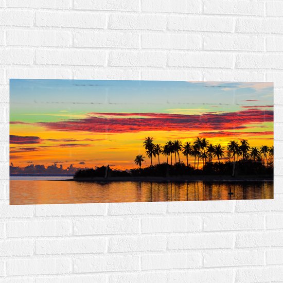 Muursticker - Silhouet van Palmbomen aan het Water tijdens Zomerse Zonsondergang - 100x50 cm Foto op Muursticker