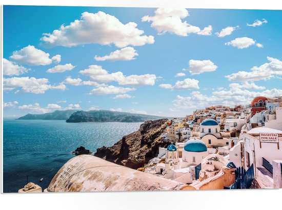 WallClassics - PVC Schuimplaat- Klassiek Witte Huisjes in Santorini - 75x50 cm Foto op PVC Schuimplaat