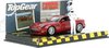 The 1:43 Diecast Modelcar of the Aston Martin Vanquish S Top Gear of 2004 in Red Metallic. The manufacturer of the scalemodel is Minichamps.This model is only online available