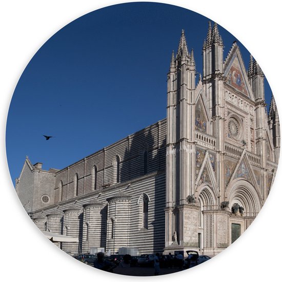 PVC Schuimplaat Muurcirkel - Zijaanzicht van Vogel boven Kathedraal van Orvieto onder Blauwe Lucht in Italië - 100x100 cm Foto op Muurcirkel (met ophangsysteem)