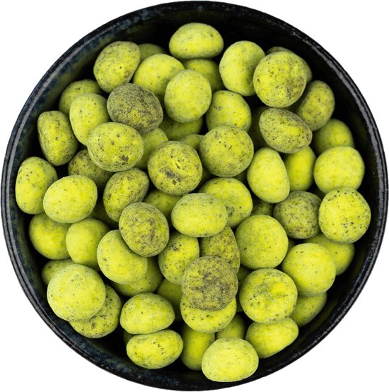 Zwarte kom gevuld met Van Delft pistache witte choc kruidnoten. Zachte, groene kruidnoten met witte chocolade omhuld.