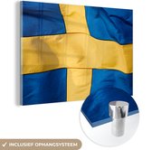 MuchoWow® Glasschilderij 60x40 cm - Schilderij acrylglas - Close-up van de vlag van Zweden - Foto op glas - Schilderijen