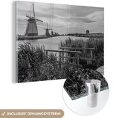 MuchoWow® Glasschilderij 30x20 cm - Schilderij acrylglas - Molen - Nederland - Zwart - Wit - Foto op glas - Schilderijen