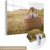 MuchoWow® Glasschilderij 60x40 cm - Schilderij glas - Gevulde picknickmand in het gras - Foto op acrylglas - Schilderijen