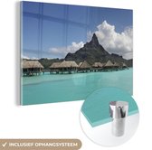 MuchoWow® Glasschilderij 120x80 cm - Schilderij acrylglas - Waterbungalows in lagune - Foto op glas - Schilderijen