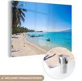 MuchoWow® Glasschilderij 120x80 cm - Schilderij acrylglas - De oever van het strand op het Eiland Moorea in Frans-Polynesië - Foto op glas - Schilderijen