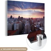 MuchoWow® Glasschilderij 150x100 cm - Schilderij acrylglas - Zonsondergang over Johannesburg - Foto op glas - Schilderijen
