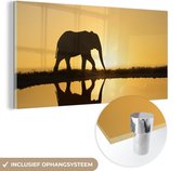 MuchoWow® Glasschilderij 40x20 cm - Schilderij acrylglas - Silhouet van een olifant bij zonsondergang - Foto op glas - Schilderijen