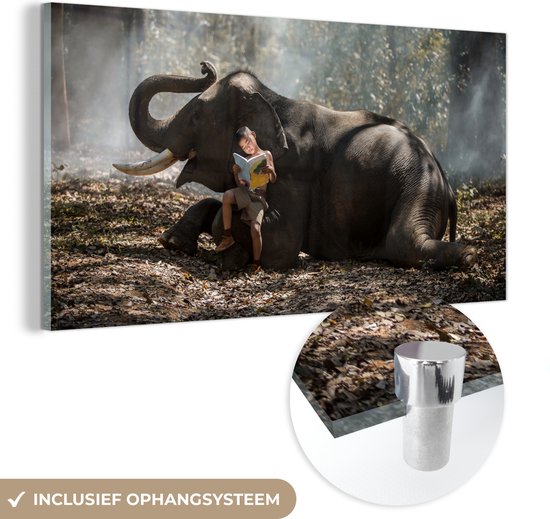 MuchoWow® Glasschilderij 40x20 cm - Schilderij acrylglas - Olifant - Jongen - Boek - Bos - Dieren - Natuur - Foto op glas - Schilderijen