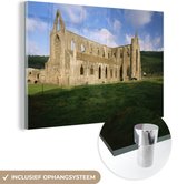 MuchoWow® Glasschilderij 60x40 cm - Schilderij acrylglas - Zijaanzicht van de Tintern Abbey in Wales - Foto op glas - Schilderijen