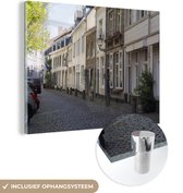 MuchoWow® Glasschilderij 80x60 cm - Schilderij acrylglas - Straat - Maastricht - Nederland - Foto op glas - Schilderijen