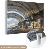MuchoWow® Glasschilderij 180x120 cm - Schilderij acrylglas - Station - Trein - Haarlem - Foto op glas - Schilderijen