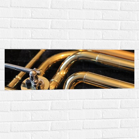 Muursticker - Gouden Details van Blaasinstrument - 90x30 cm Foto op Muursticker