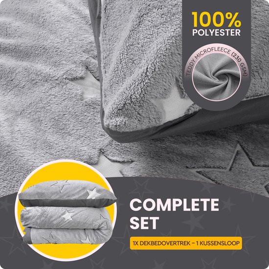 Grijze dekbedovertrek en kussensloop van teddy microfleece met oplichtende sterren, 100% polyester.