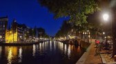 Fotobehang Amsterdams gracht by night 350 x 260 cm - € 235,--