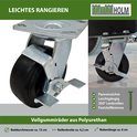 Close-up van de zwenkwielen met rem van de portaalkraan. 'Leichtes Rangieren' (licht manoeuvreren), 'Vollgummiräder aus Polyurethan' (massief rubberen wielen van polyurethaan).