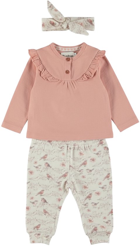 Roze longsleeve met ruches en knoopjes, met vogelprint broek en haarband.