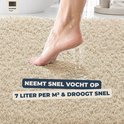 Lichtbeige badmat met shaggy textuur. Neemt snel vocht op, 7 liter per m² & droogt snel.