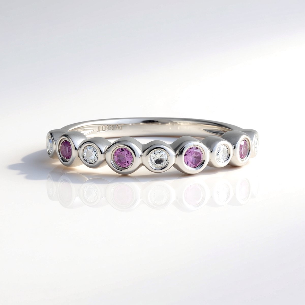 Cavill - Elegante Damesring - 925 Sterling Zilver Platina Verguld - 4 Roze Saffieren (0,13 ct) & 5 Zirkonen (0,18 ct) - Ronde Zetting