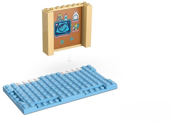 Jouet scanner à rayons X LEGO avec un cochon d'Inde sur une base de construction bleue.