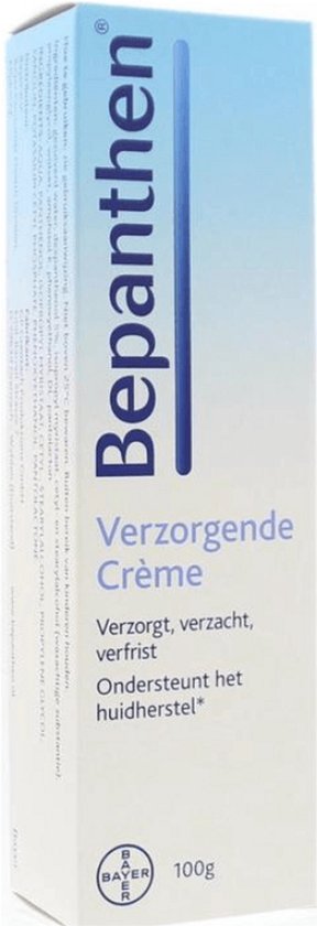 Witte verpakking met blauwe en lichtblauwe gradiënt. Bepanthen Verzorgende Crème 100g.