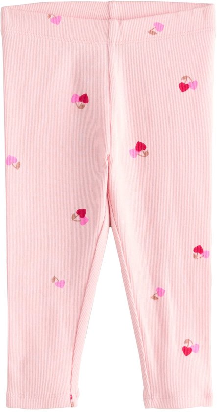 Lichtroze, geribbelde legging met een print van kleine hartjes.