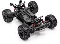 Onderstel van zwarte RC monster truck met rode schokdempers, grote off-road banden en 4x4 aandrijving.