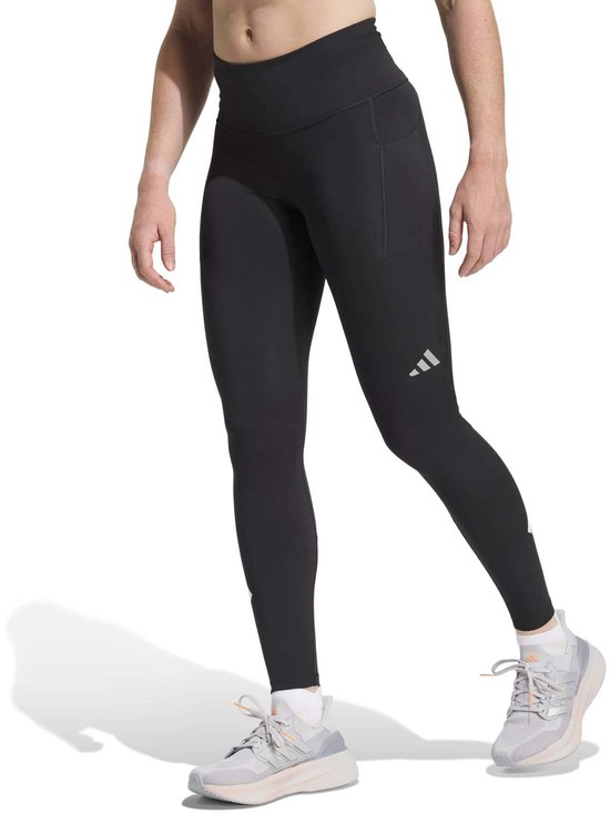 Zwarte dames legging met drie reflecterende strepen op de kuit.