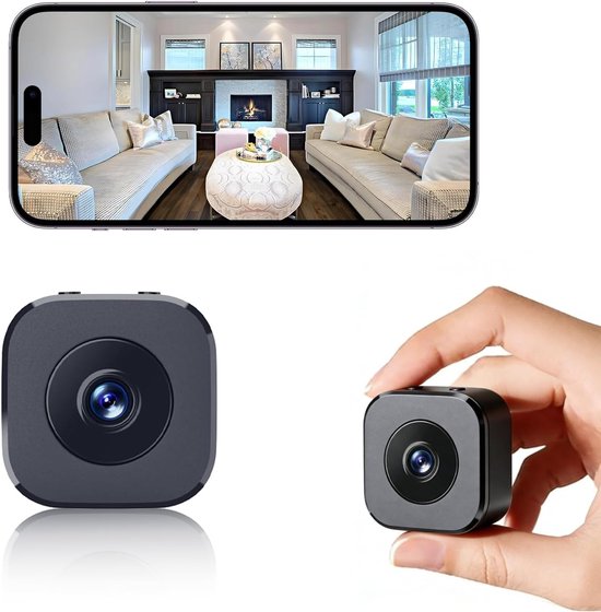 Zwarte minicamera, bij de hand gehouden, en weergave van een woonkamer op een smartphone.