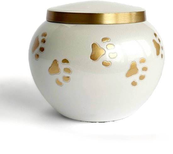 Witte ronde dierenurn met glanzende gouden pootafdrukken en gouden rand.