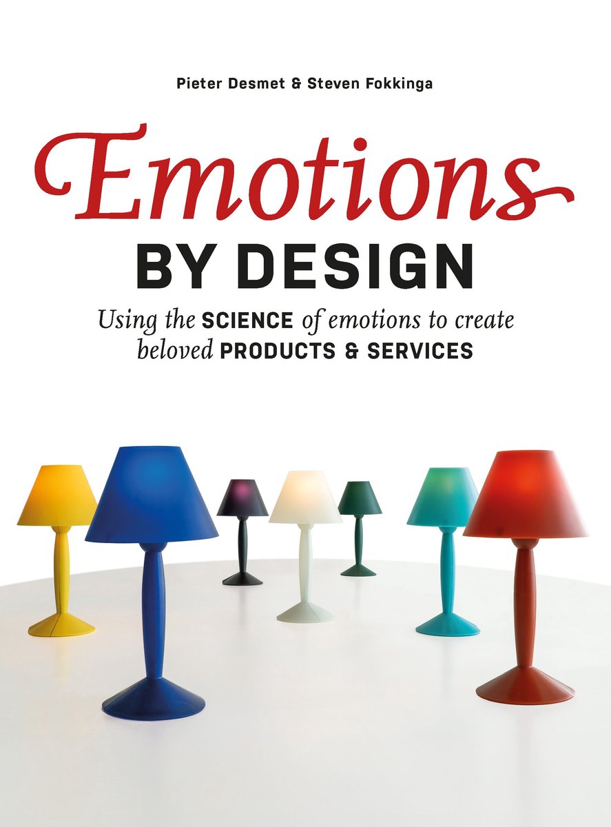 De kaft van het boek 'Emotions BY DESIGN' met een rij kleurrijke tafellampen op de voorgrond.