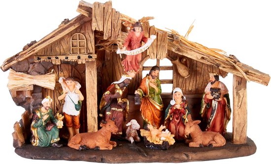 Gedetailleerde kerststal met 11 figuren in levendige kleuren, inclusief baby Jezus, Maria, Jozef, koningen, herder, engelen, schaap, os en ezel.
