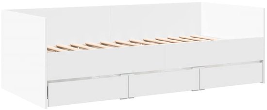 Witte slaapbank met drie lades, houten lattenbodem zichtbaar.