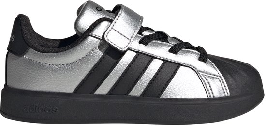 Zilveren Adidas sneaker met zwarte strepen, veters en klittenband.