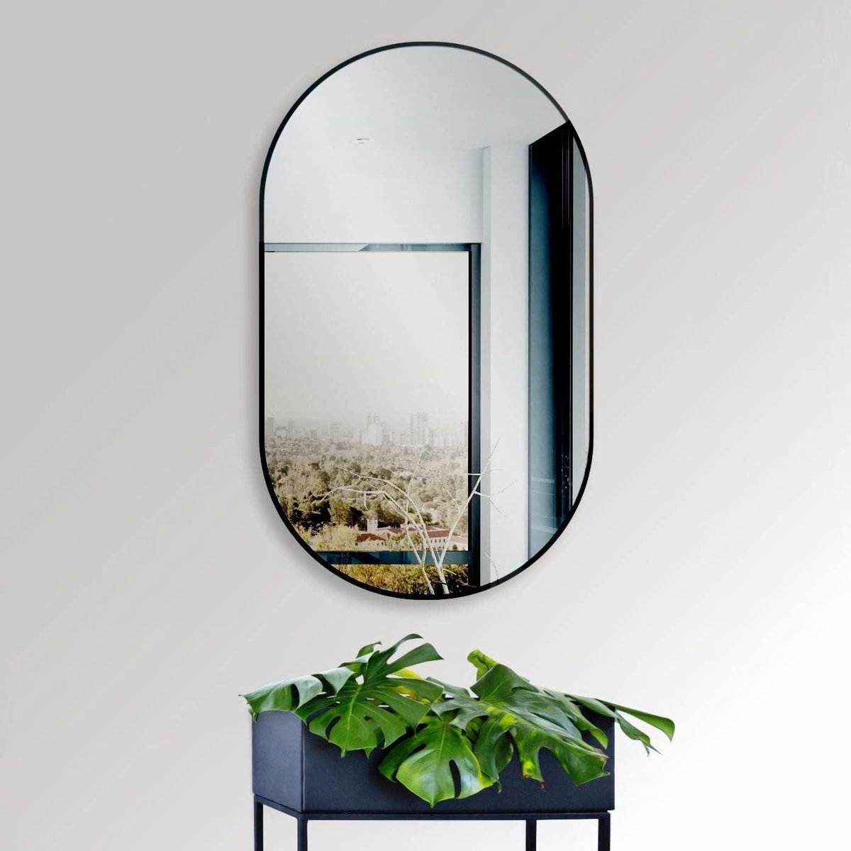 Wandspiegel Ovaal - Design Spiegel - Ruimte Effect - Hoog en Dwars Montage - 45 x 75 cm - Mat Zwart