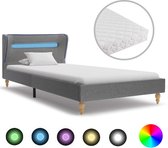 Bed met LED en matras stof lichtgrijs 90x200 cm