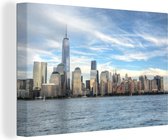 Canvas Schilderij De skyline van Manhattan met het One World Trade Center - 120x80 cm - Wanddecoratie