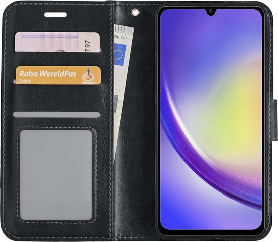Étui livre noir ouvert avec porte-cartes, billets et smartphone avec fond d'écran violet, jaune et blanc.