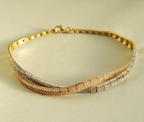 14 karaat geel- wit en rosé gouden armband met zirkonia
