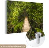 MuchoWow® Glasschilderij 150x100 cm - Schilderij acrylglas - Houten hangbrug in het Nationaal Park Triglav in Slovenië - Foto op glas - Schilderijen