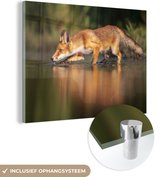 MuchoWow® Glasschilderij 120x90 cm - Schilderij acrylglas - Vos - Jagen - Water - Foto op glas - Schilderijen