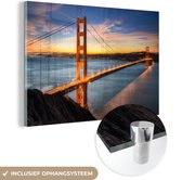 MuchoWow® Glasschilderij 120x80 cm - Schilderij acrylglas - The Golden Gate Bridge - Foto op glas - Schilderijen