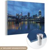 MuchoWow® Glasschilderij 180x120 cm - Schilderij acrylglas - De stadshorizon van Cincinnati in Amerika vlak voor zonsopkomst - Foto op glas - Schilderijen